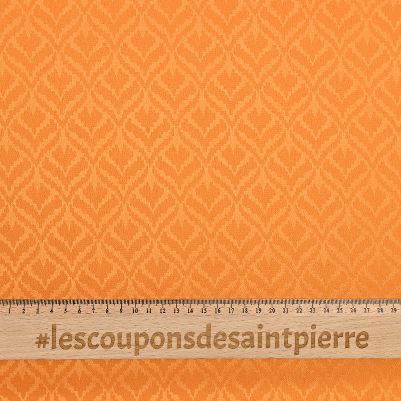 Crêpe satin de polyester Lola fond orange