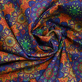 Coton imprimé mandala indigo, vert et orange