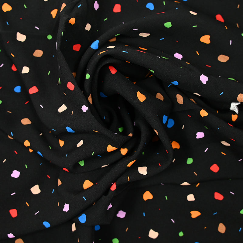 Viscose imprimée confettis multicolore fond noir