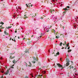 Viscose imprimée fleurs rose fond rose