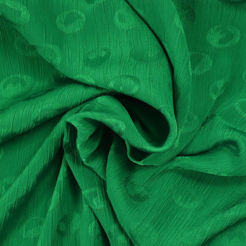 Mousseline polyester crinkle Elfy fond vert