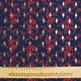 Microfibre imprimée polyester fleurs rouges et losanges argent fond marine