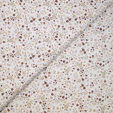 Coton imprimé ouragan floral marron fond blanc