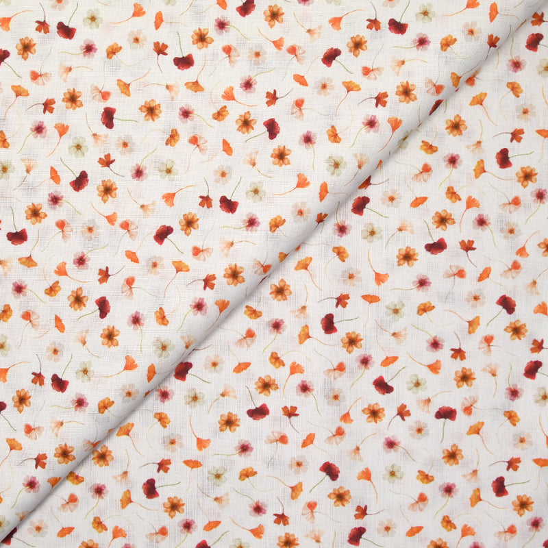 Coton imprimé au gré du vent orange fond blanc