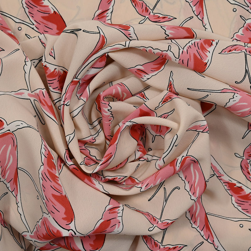 Crêpe de polyester imprimé vol du flamant fond rose chair