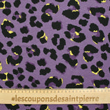 Jersey de viscose imprimé panthère noir fond violet