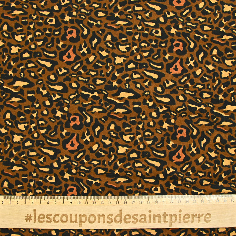 Viscose jersey printed leopard ocher brown background