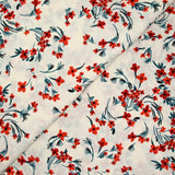 Polyester imprimé floral rouge et bleu sur fond ivoire