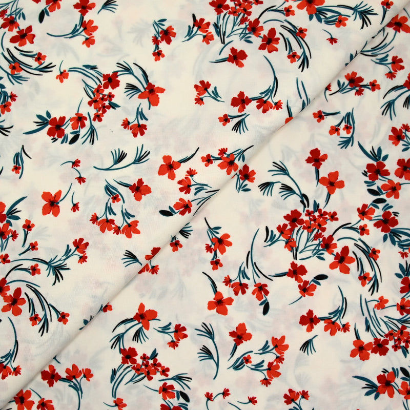 Polyester imprimé floral rouge et bleu sur fond ivoire