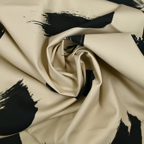 Coton élasthanne imprimé pinceaux noir fond beige