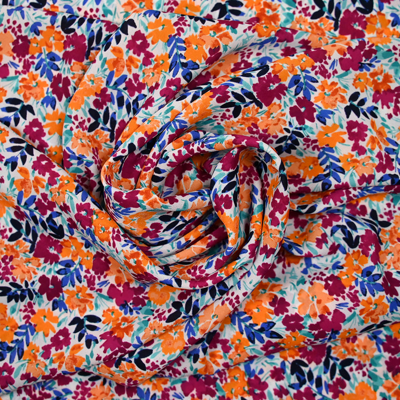 Crêpe de polyester imprimé picore nature orange fond blanc