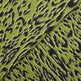Polyester imprimé texturé savane beige et noir fond vert mousse