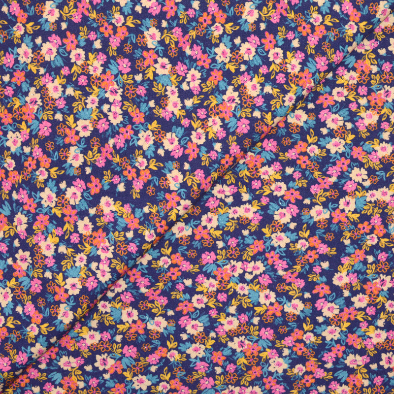 Coton imprimé fleurs bleu, rose et orange fond marine