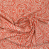 Viscose imprimée dédale corail fond beige clair