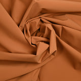 Lona de poliéster elástica naranja quemado