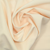 Crêpe polyester elastane fumiko pale yellow peach