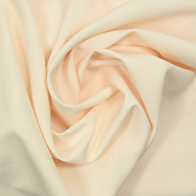 Crêpe polyester elastane fumiko pale yellow peach