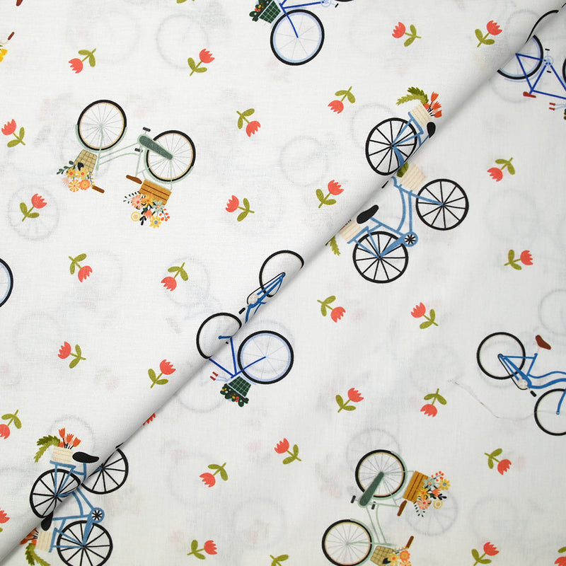 Coton imprimé balades à vélo fond blanc