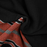100% felted wool rust and gray stripe black background