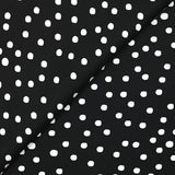 Twill de viscose imprimé à pois blanc fond noir