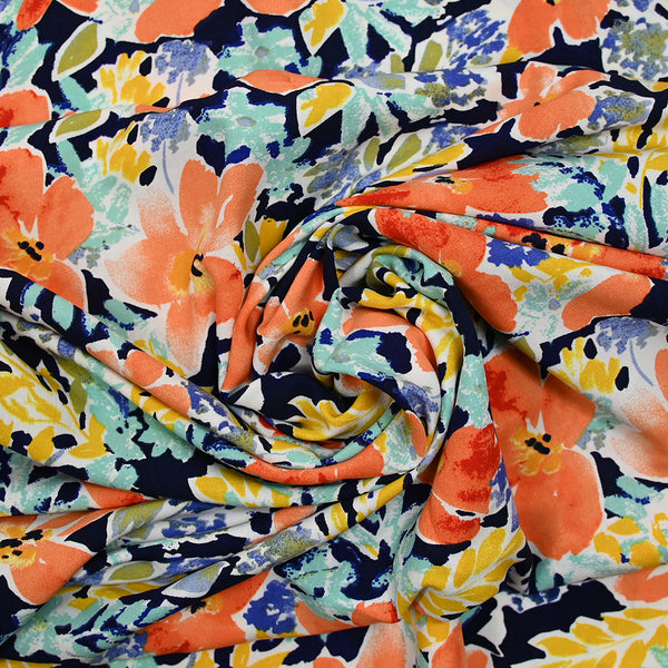 Viscose imprimée fleurs orange fond bleu marine