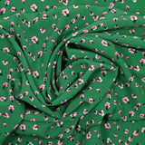 Crêpe de polyester imprimé pluie florale fond vert