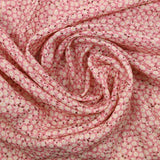 Popeline viscose imprimée lurex mini fleurs fond rose