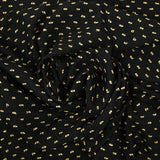 Voile de polyester plumetis beige fond noir