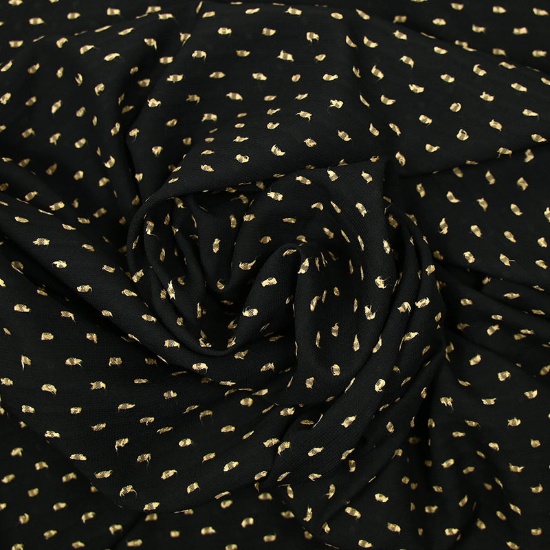 Voile de polyester plumetis beige fond noir