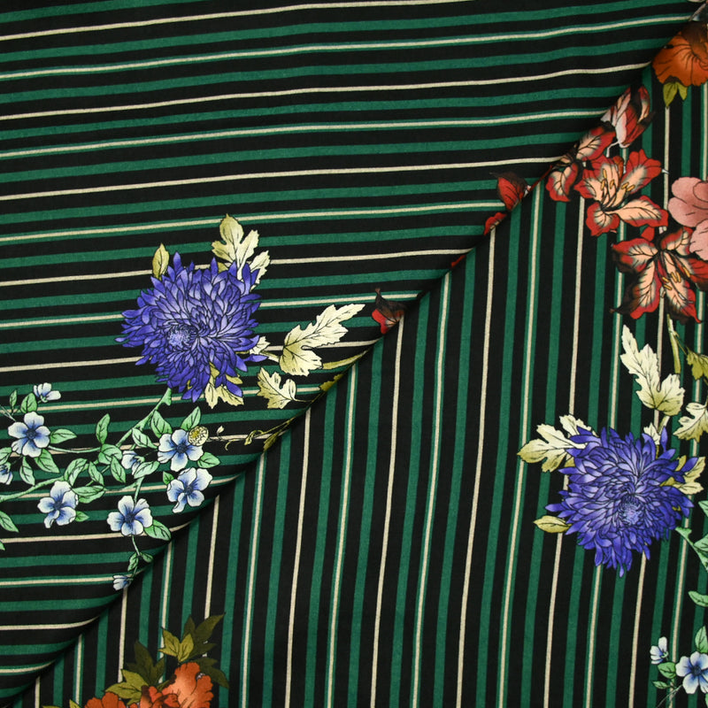 Jersey de viscose imprimé rayé vert et noir avec des fleurs