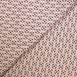 Crépon imprimé étoile marine fond rose chair
