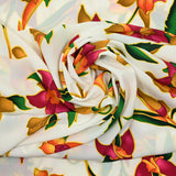 Crêpe de polyester imprimé fleurs fuchsia et moutarde fond blanc