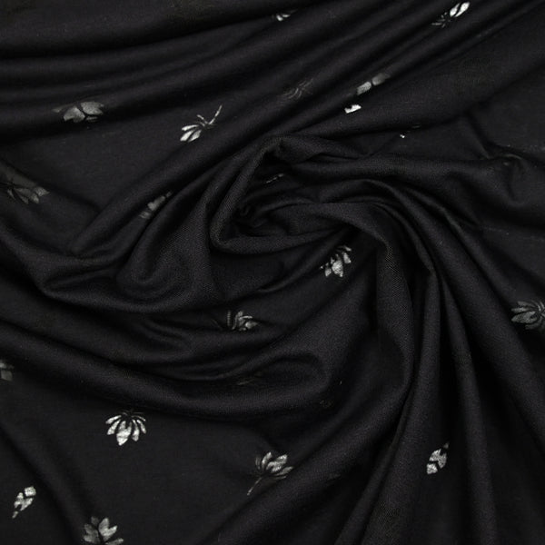 Jersey de coton fin ajouré feuilles fond noir