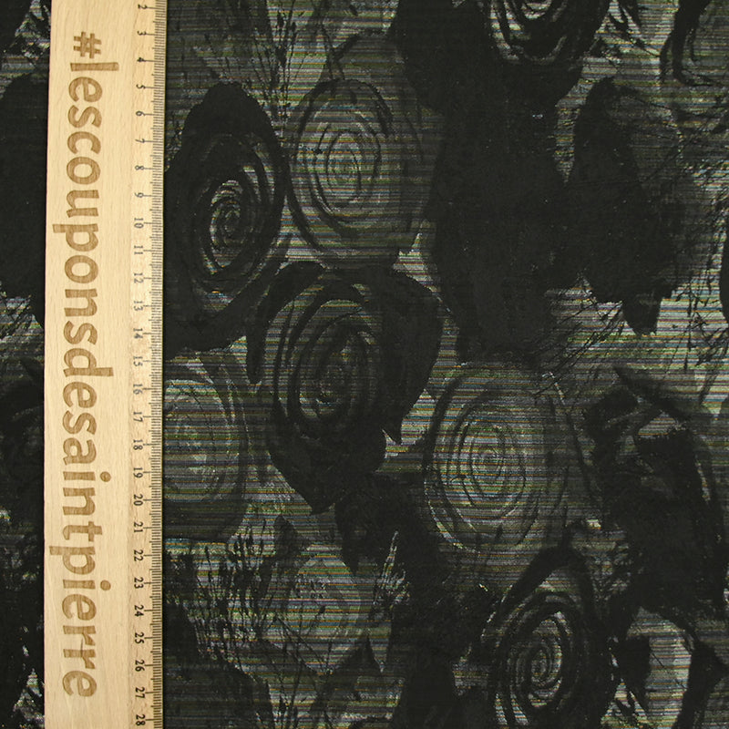 Toile tissée teinte fleurs noires et lignes multicolores brillantes
