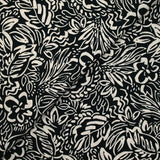 Coton imprimé croquis fleurs blanc fond noir