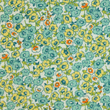 Popeline de coton imprimée champs de fleurs vert