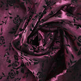 Toile polyviscose irisée floquée fond lie de vin