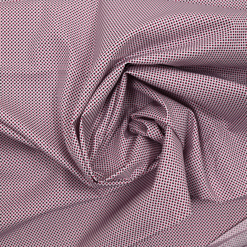 Coton imprimé petits éléments rose fond blanc