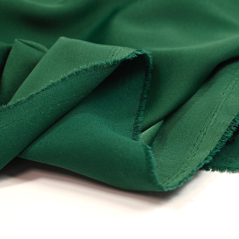 Crêpe satin polyester vert bouteille