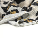 Maille polyester imprimée lurex léopard fond beige