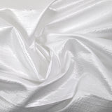 Satin polyester effet reptile blanc