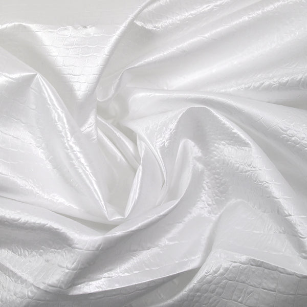 Satin polyester effet reptile blanc