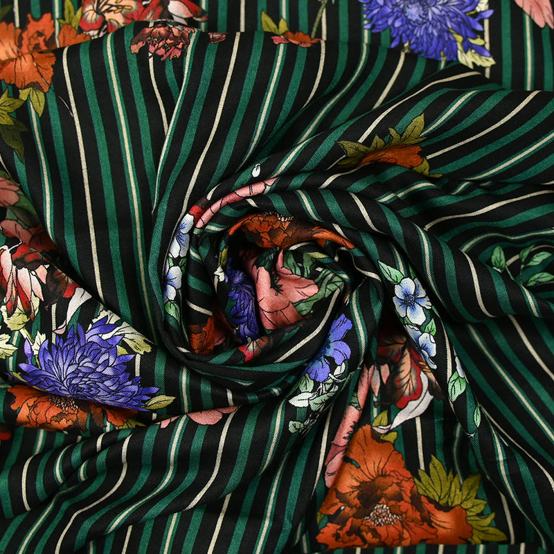 Jersey de viscose imprimé rayé vert et noir avec des fleurs