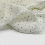 Fine viscose satin printed green star of gray ecru background