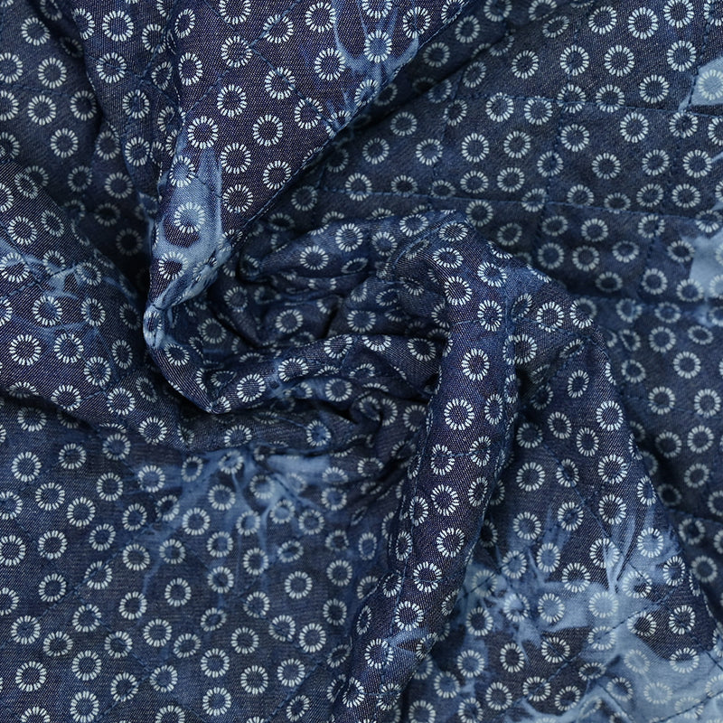 Chambray matelassé imprimé tie and dye cercle en pétales