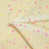 Wool blend tweed pink and blue confetti yellow background