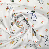 Coton imprimé balades à vélo fond blanc