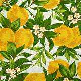 Polycoton imprimé citrons et fleurs fond blanc