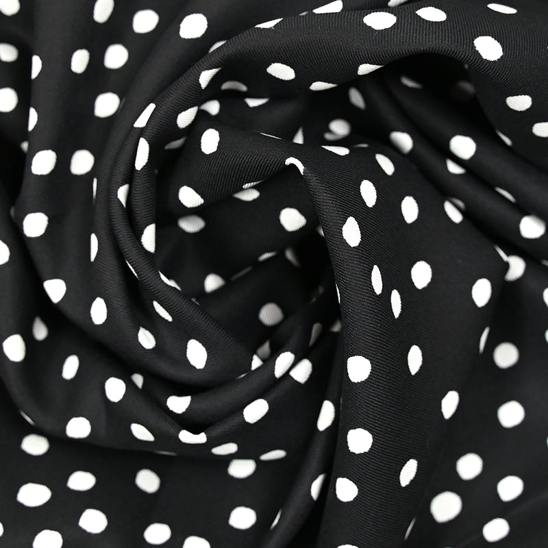 Twill de viscose imprimé à pois blanc fond noir