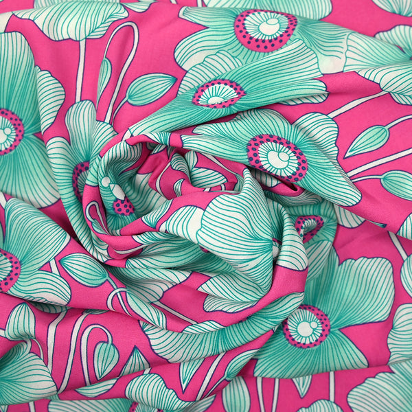 Viscose imprimée fleurs nervurés fond rose